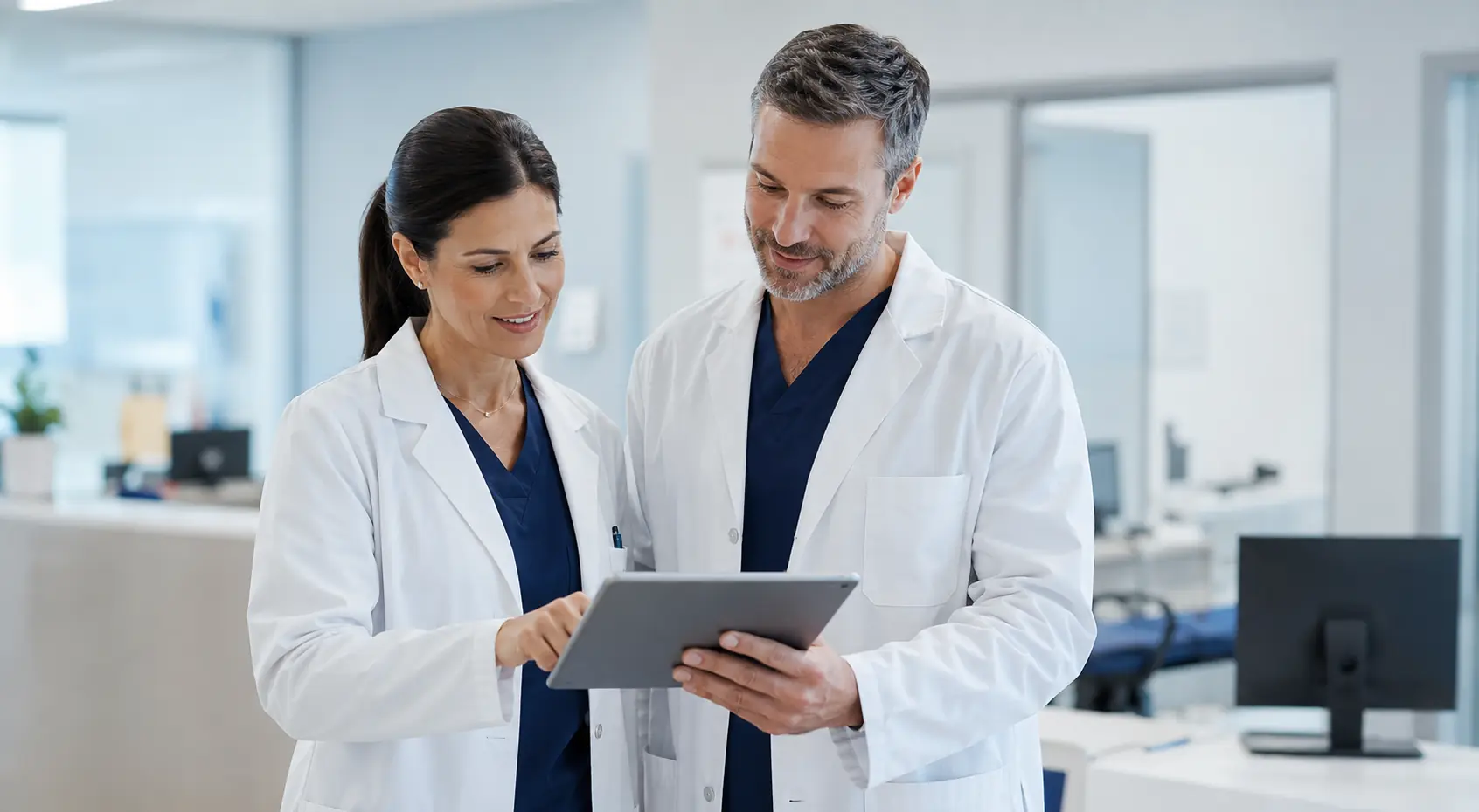 Healthcare professionals reviewing practice information